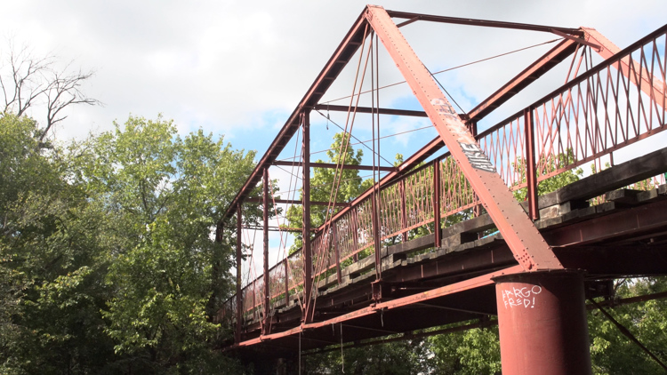 Old Alton Bridge, also known as Goatman's Bridge, a historic wrought-iron structure in Denton County, Texas.